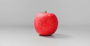 Apple on gray surface
